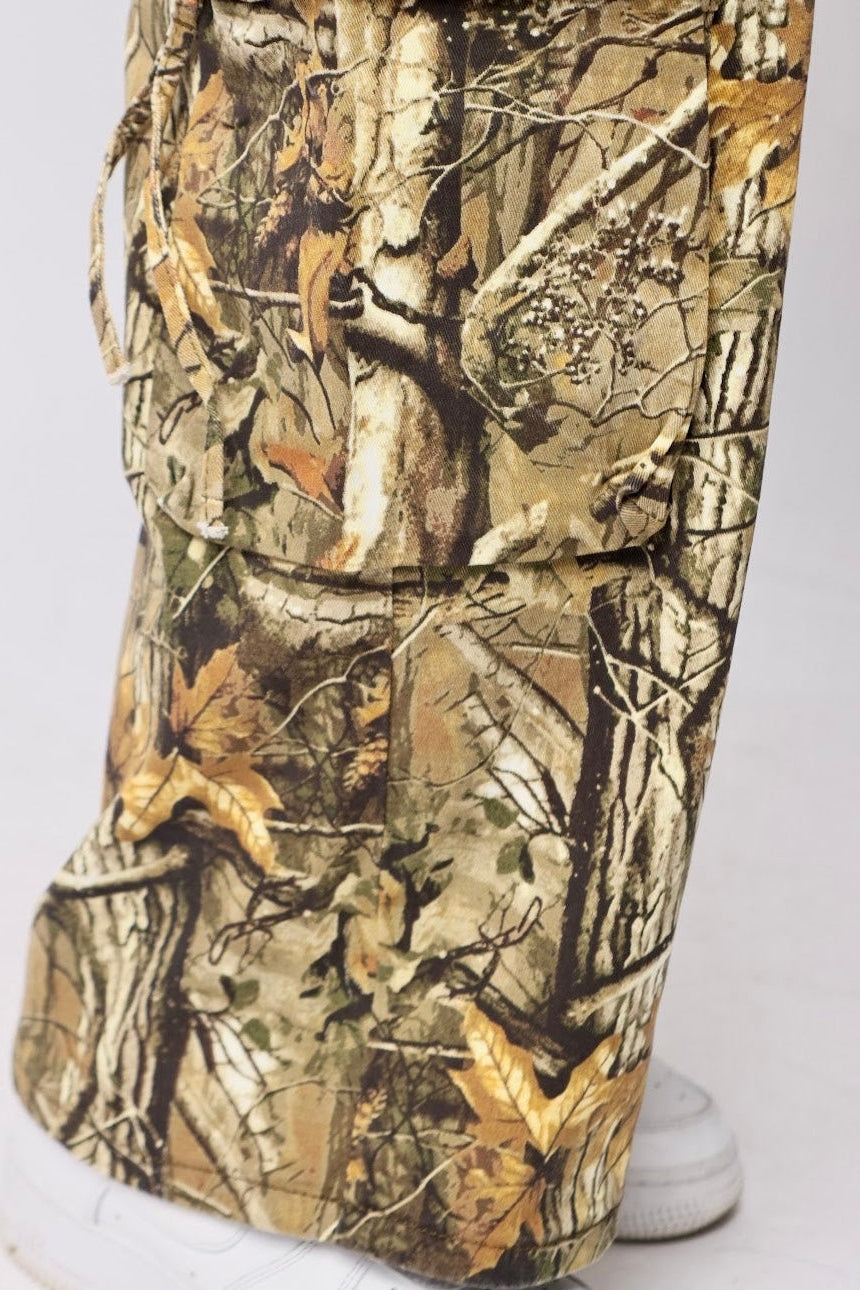 Real tree camo cargo pants bottom side view pocket detail — Baebekillinem
