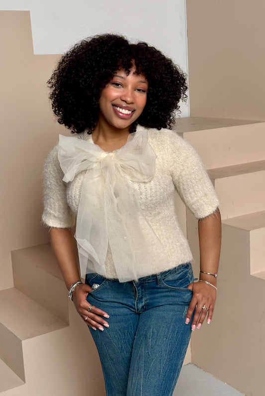 Women's fuzzy bow sweater top cream knit front view — Baebekillinem