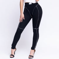 Women's skinny stretch outline leggings black front view — Baebekillinem