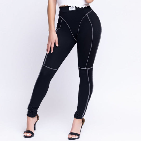 Women's skinny stretch outline leggings black front view — Baebekillinem